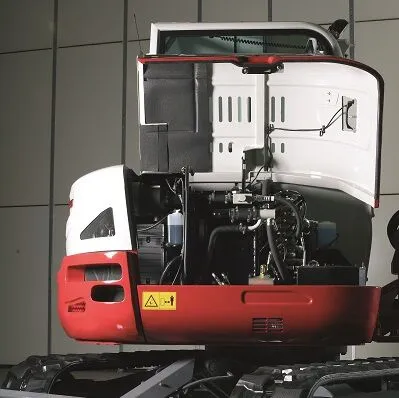 Takeuchi TB260 compact excavator with engine cover open