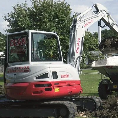 Takeuchi TB260 compact excavator digging outdoors
