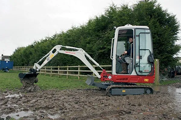Takeuchi TB216 compact excavator on a groundworks project