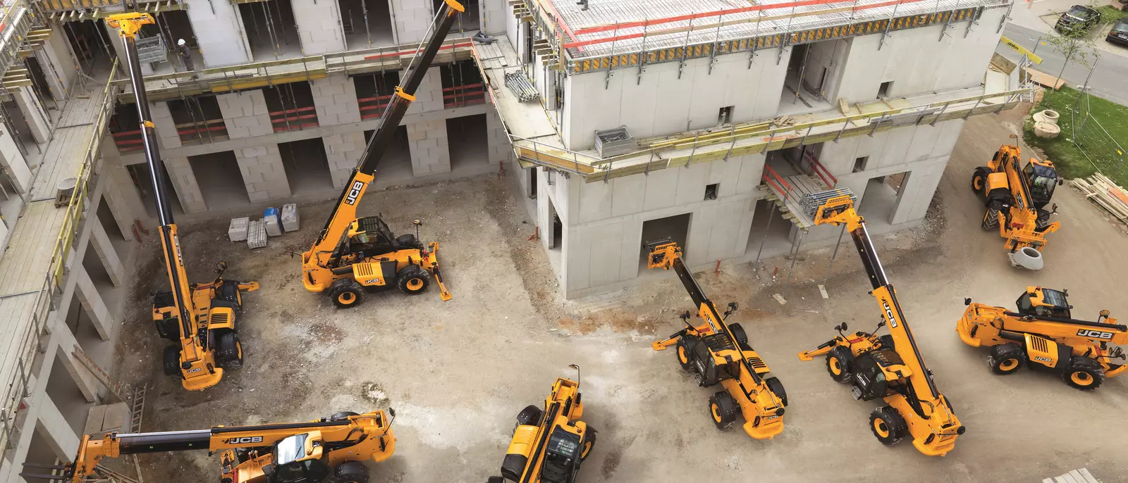 JCB 540-170 telehandlers working inside a large building project