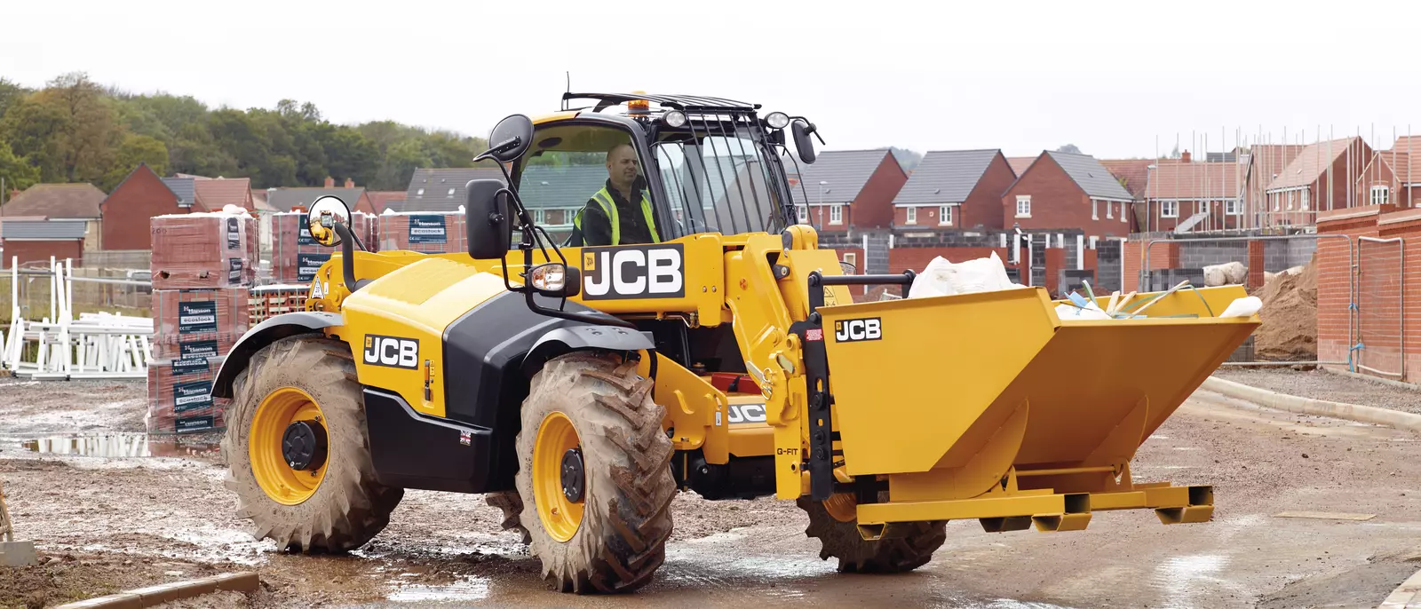 JCB 531-70 telehandler working on a housing development