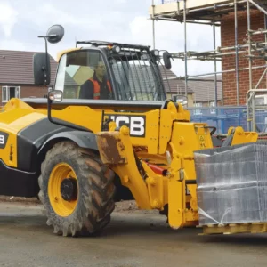 JCB 535-125 telehandler carrying building materials