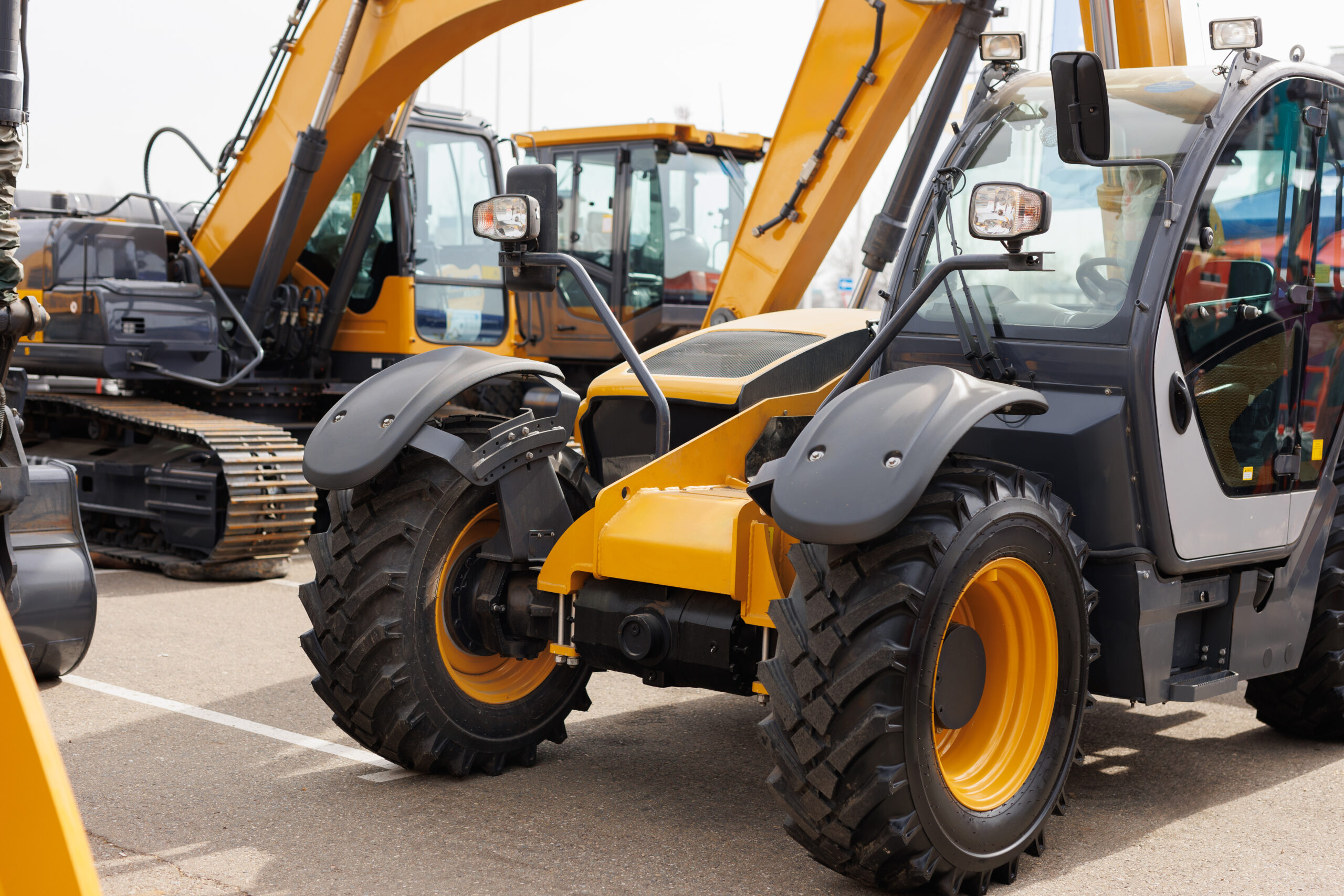 Row of new mini excavators for a plant hire gallery in the UK