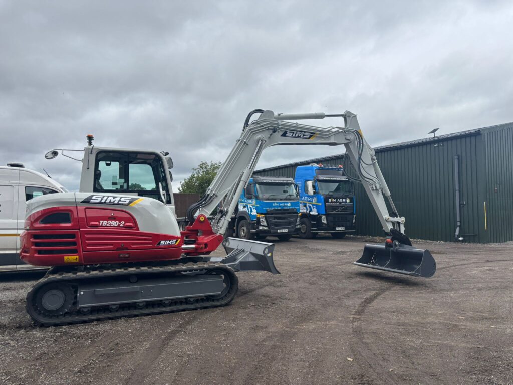 Two Takeuchi mini excavators parked at the Sims Plant Hire depot for the groundworks machinery available in the UK