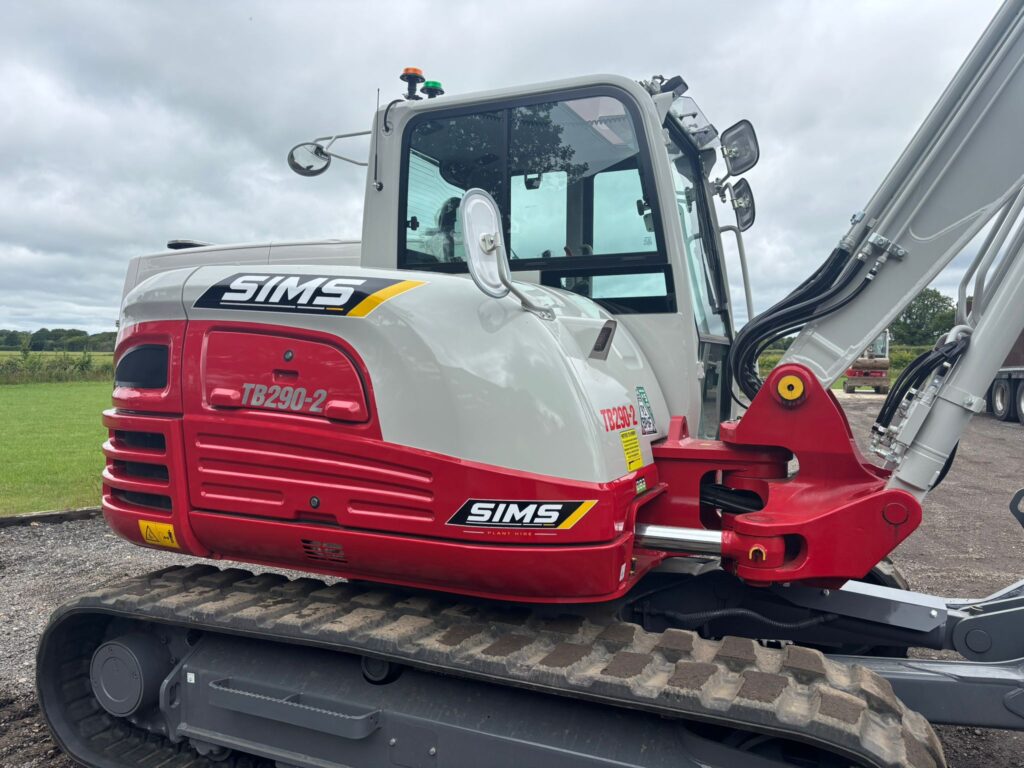 Takeuchi compact excavator in Sims livery for construction equipment hire