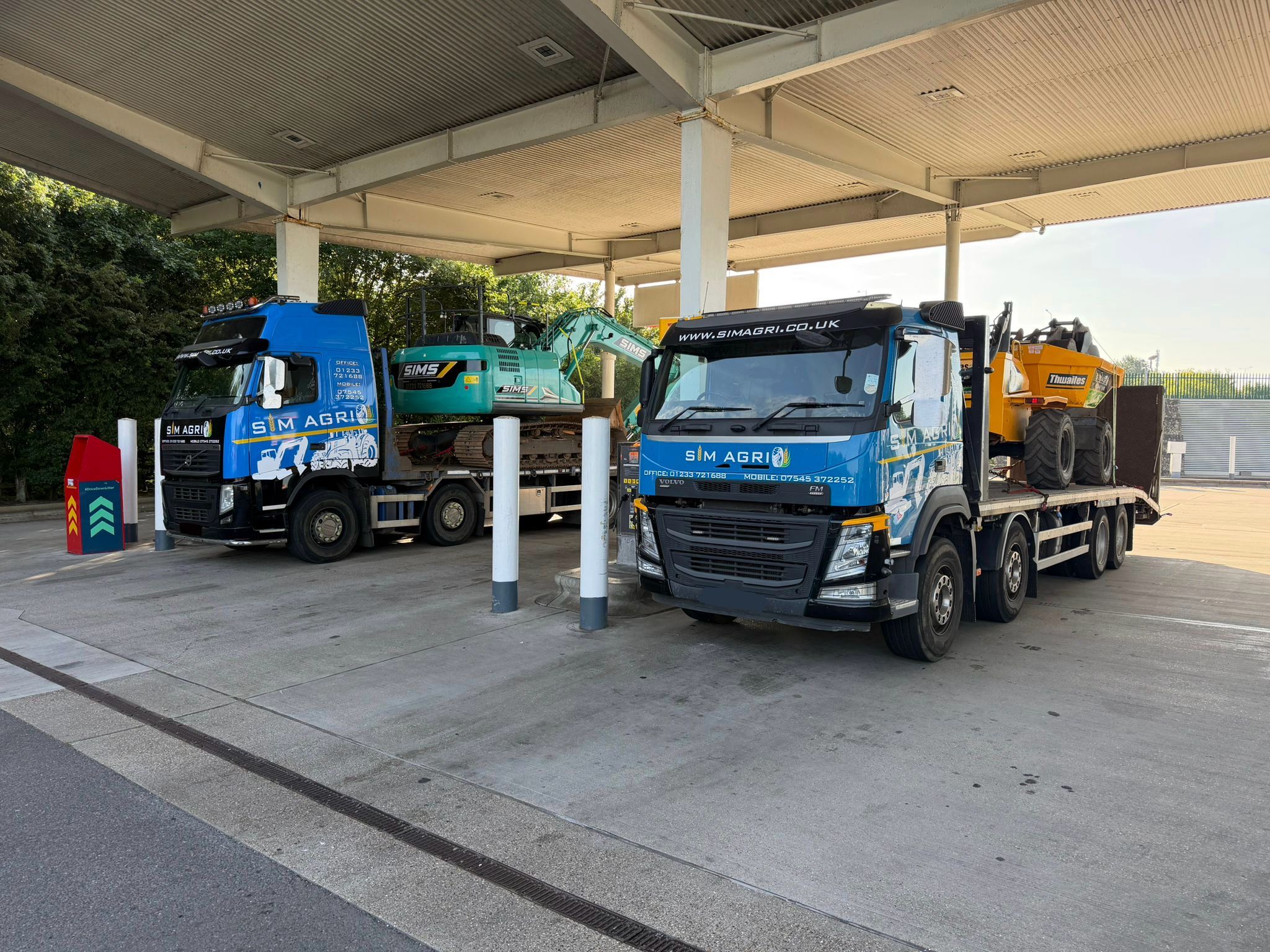 Sims plant transport lorries supporting domestic plant hire