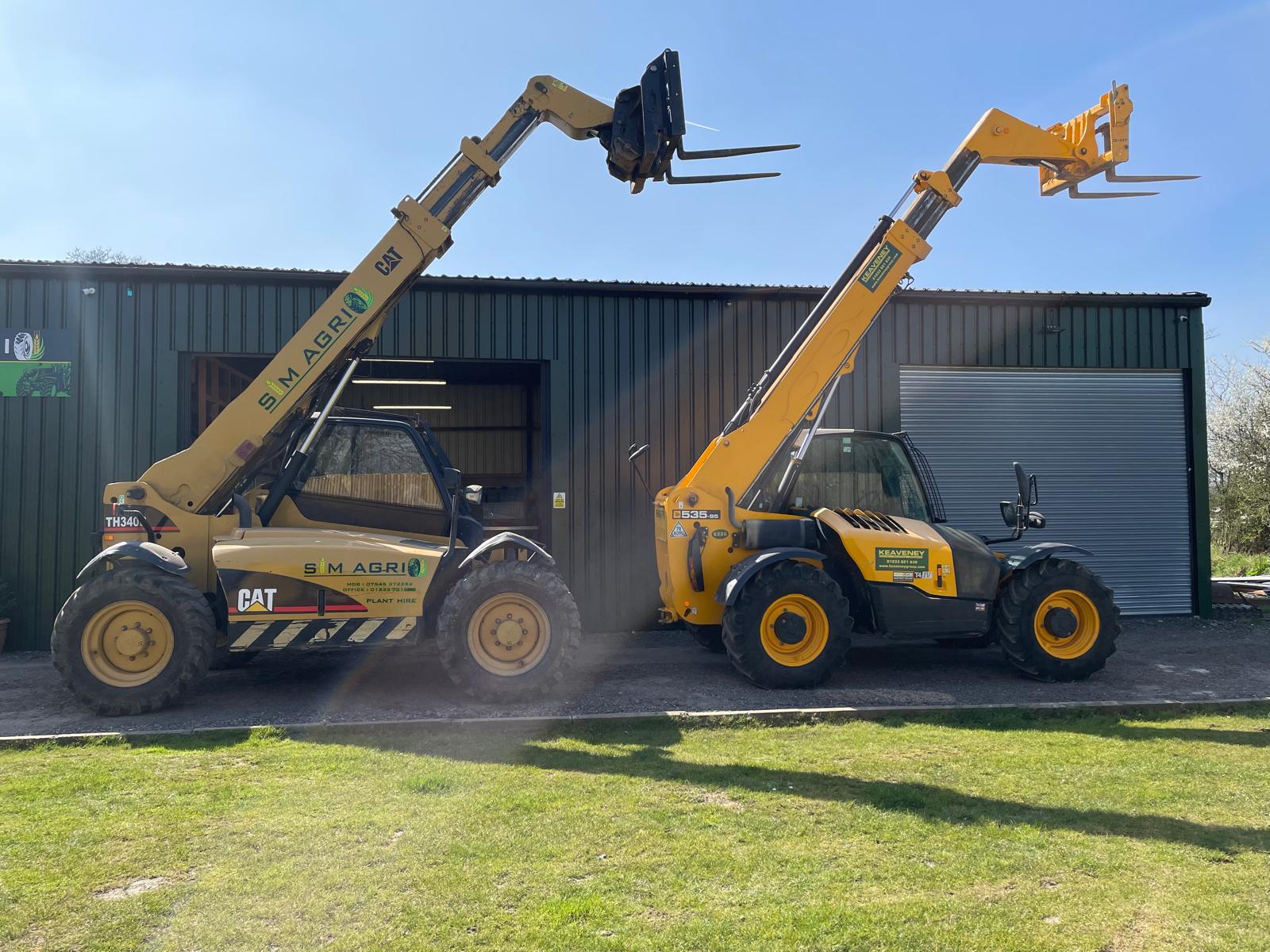 Two telehandlers with raised booms for plant hire in Bournemouth