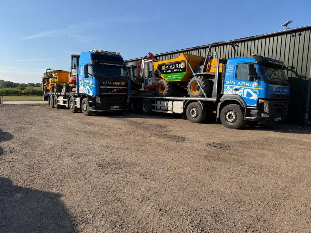 Sims lorries and low-loaders parked in the depot yard for the plant hire gallery in the UK