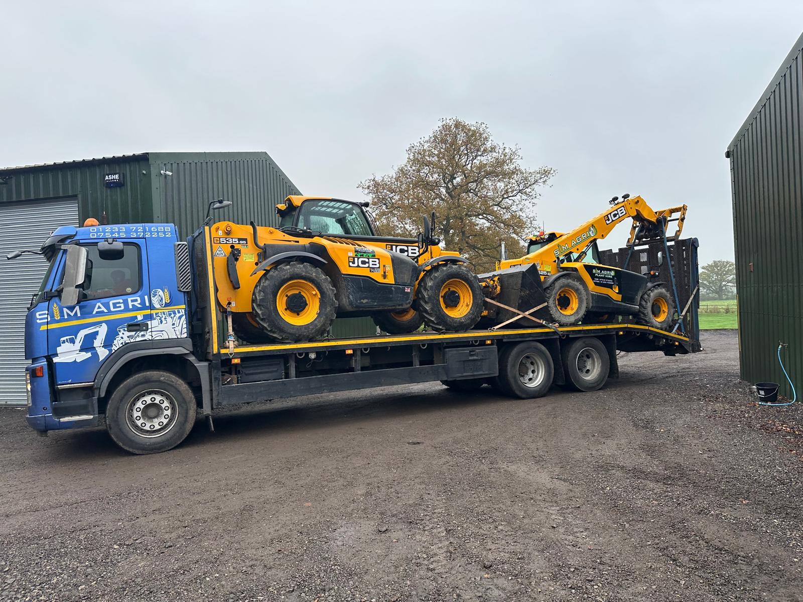 Sims low-loader carrying telehandlers for plant hire in Swindon