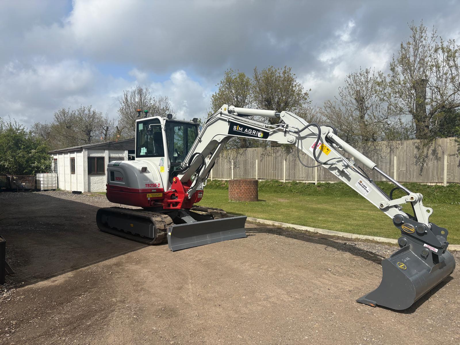 Takeuchi excavator with long-reach boom for plant hire in Cambridgeshire