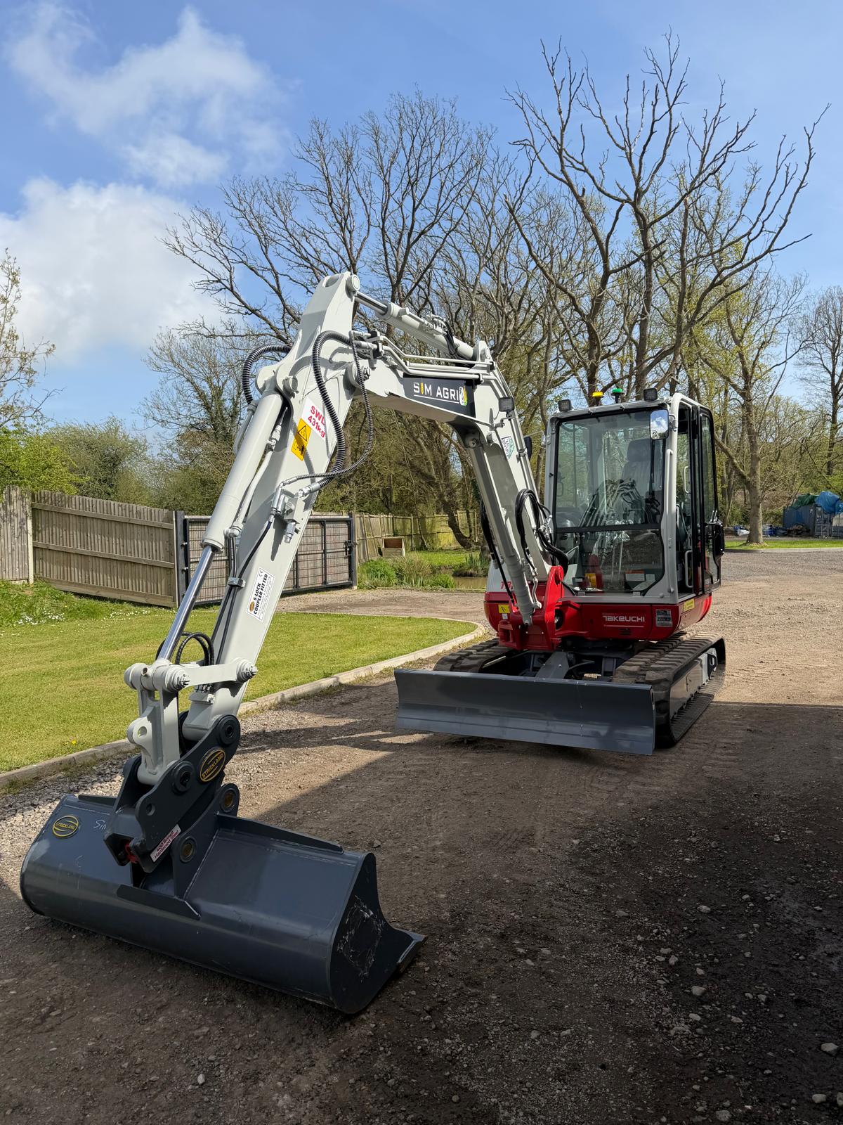 Takeuchi excavator with extended boom for plant hire in Norwich